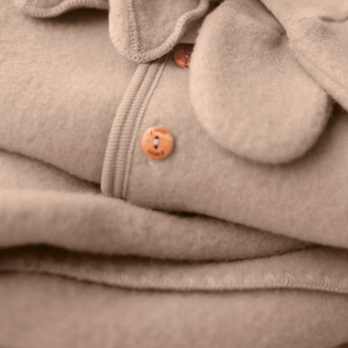 Tuta da esterno in pile di lana Sabbia
