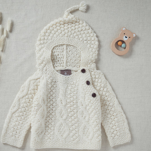 Maglioncino Aran Baby con cappuccio in Lana Irlandese lavorata a mano